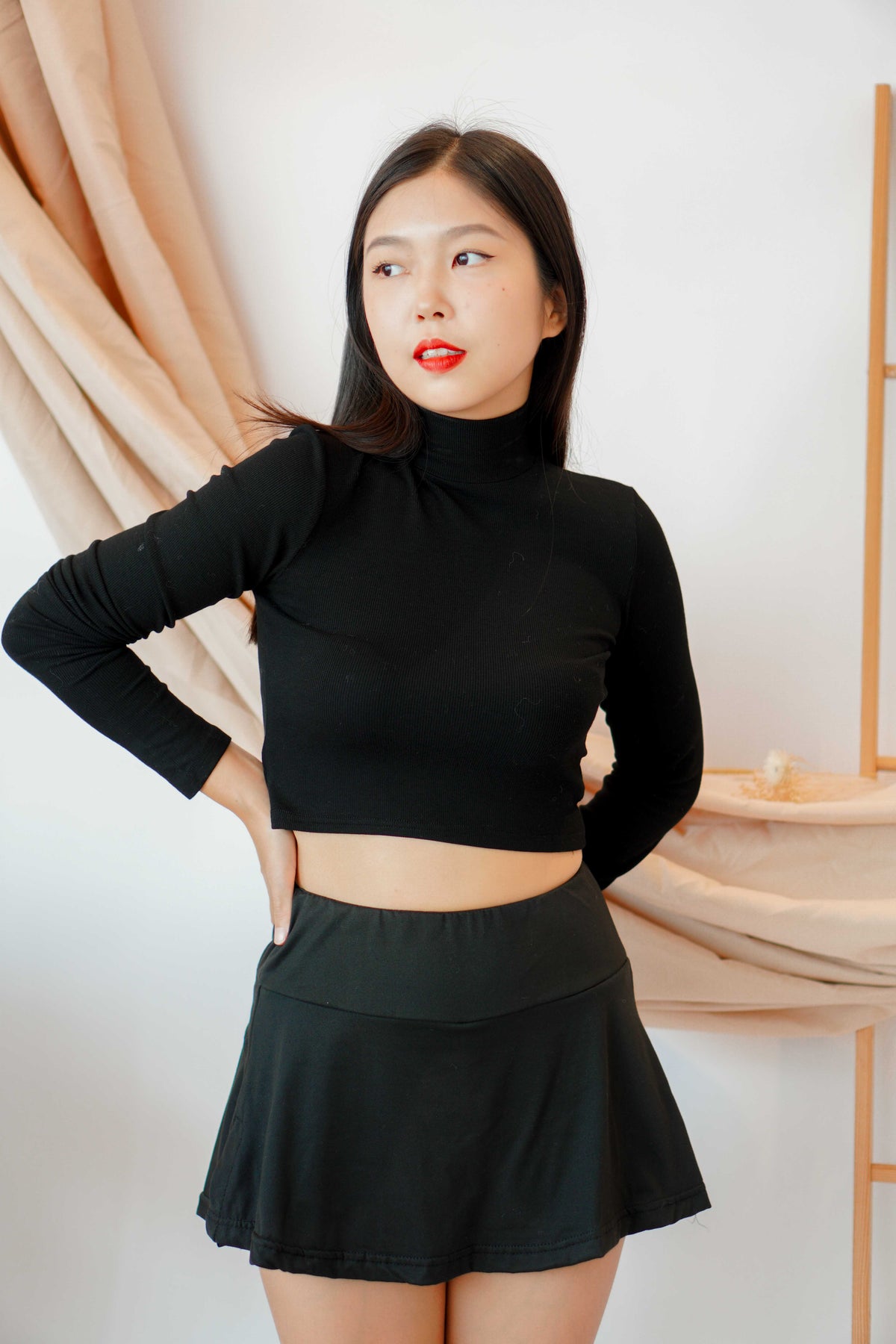 Drop Shot Mini Skirt in Black
