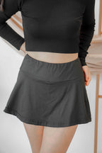 Drop Shot Mini Skirt in Black
