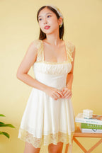 Love Tangle Ruched Bust Mini Dress in Light Yellow