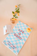 Life Is Good Checkered Rug in Teal Blue