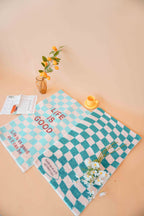 Life Is Good Checkered Rug in Teal Blue