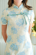 Yi Lan Short Cheongsam in Cream with Blue Knot