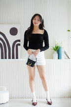 Brinley Padded Ruched Bust Long Sleeve Top in Black