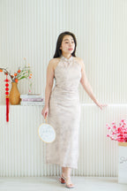 En Xi Long Halter Neck Leaves Cheongsam in Light Khaki