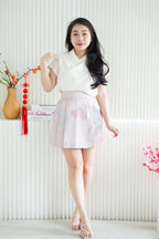 Ya Qi Printed Pleated Short Skirt in Purple