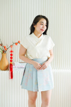 Ya Qi Printed Pleated Short Skirt in Blue