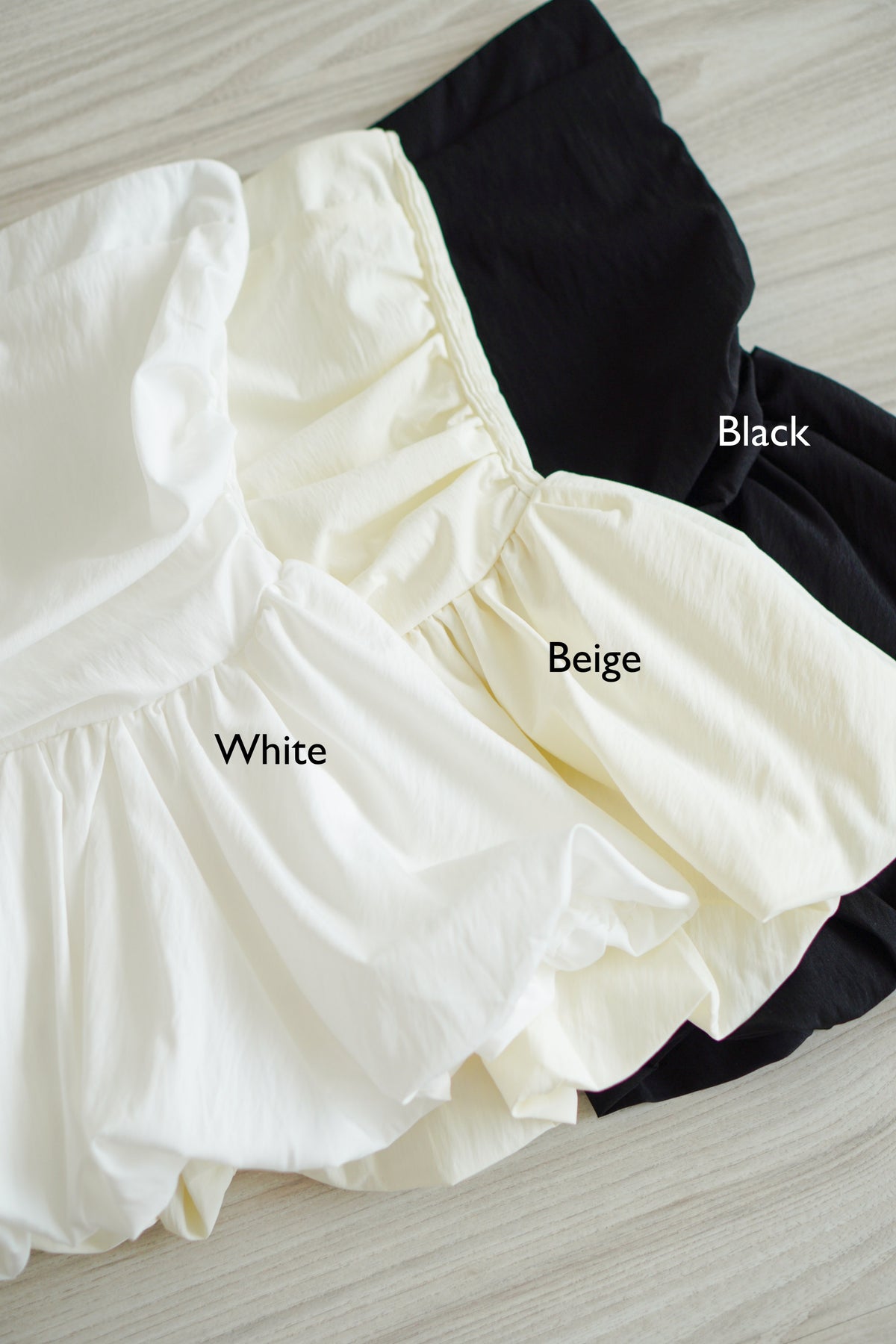 Frenchie Ruched Peplum Tube Top in Black