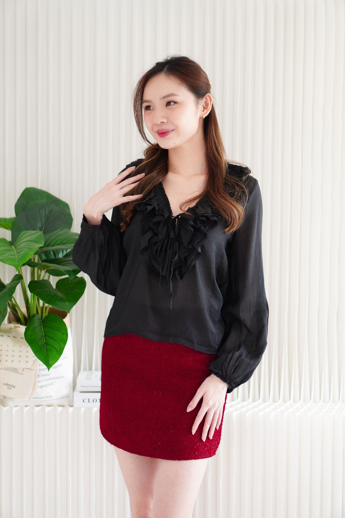 Niya Ruffles Long Sleeve Front-Tie Top in Black