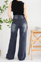 Xim Wide Legged Fade Wash Denim Jeans in Dark Blue