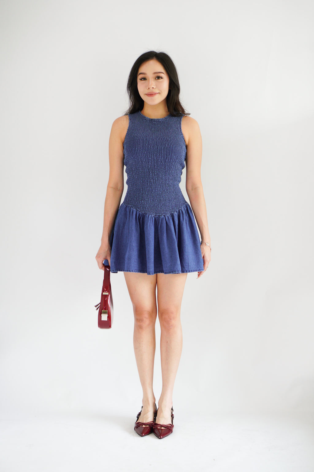 Emery Smocked Denim Mini Dress in Blue