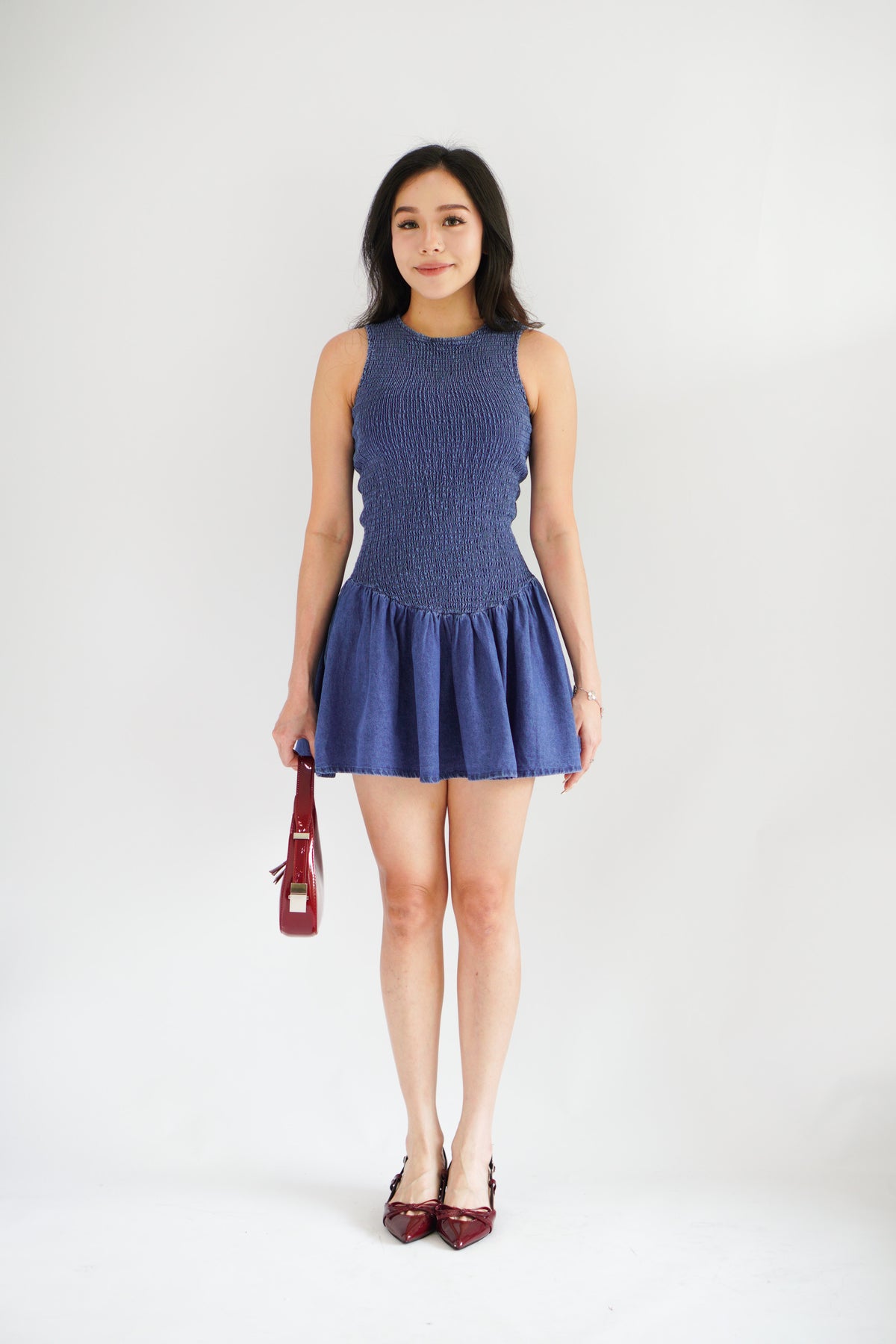 Emery Smocked Denim Mini Dress in Blue