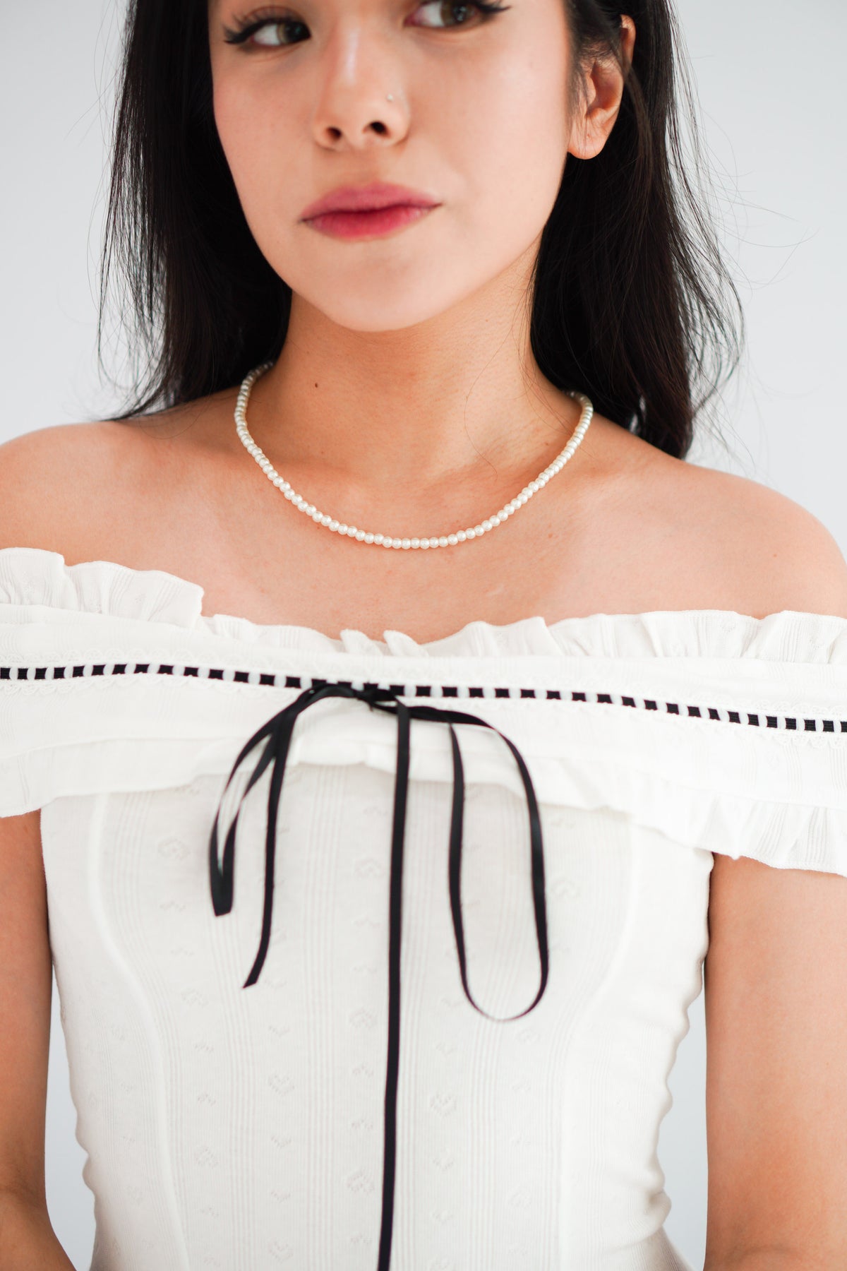 Olyssia Off Shoulder Top in White with Black Ribbon