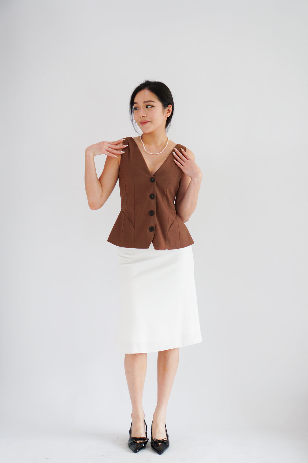 Gracey V Neck Button Down Peplum Top in Brown