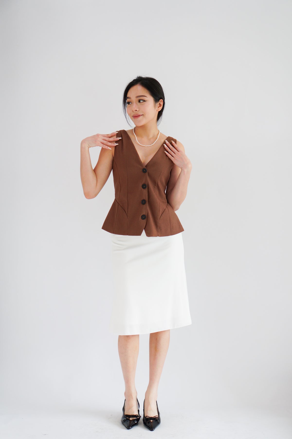 Gracey V Neck Button Down Peplum Top in Brown