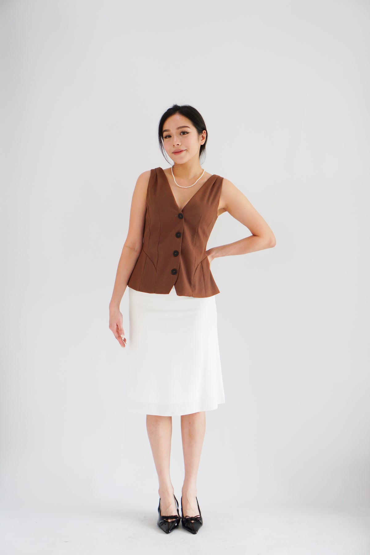 Gracey V Neck Button Down Peplum Top in Brown