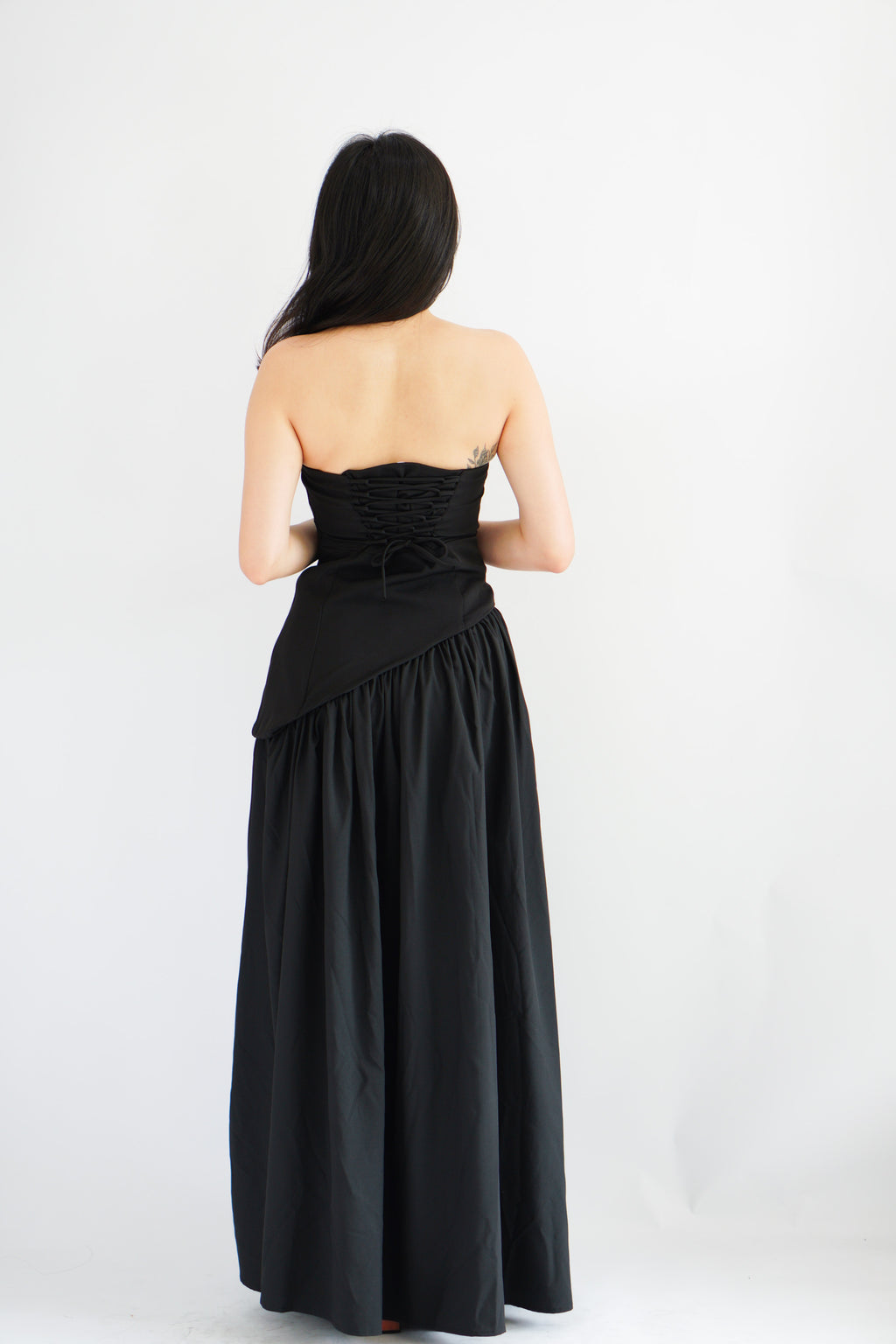 Dephora Tube Maxi Asymmetrical Dress with Sash in Black