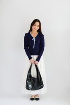 Missha Ribbon Ruffles Knit Top in Dark Blue