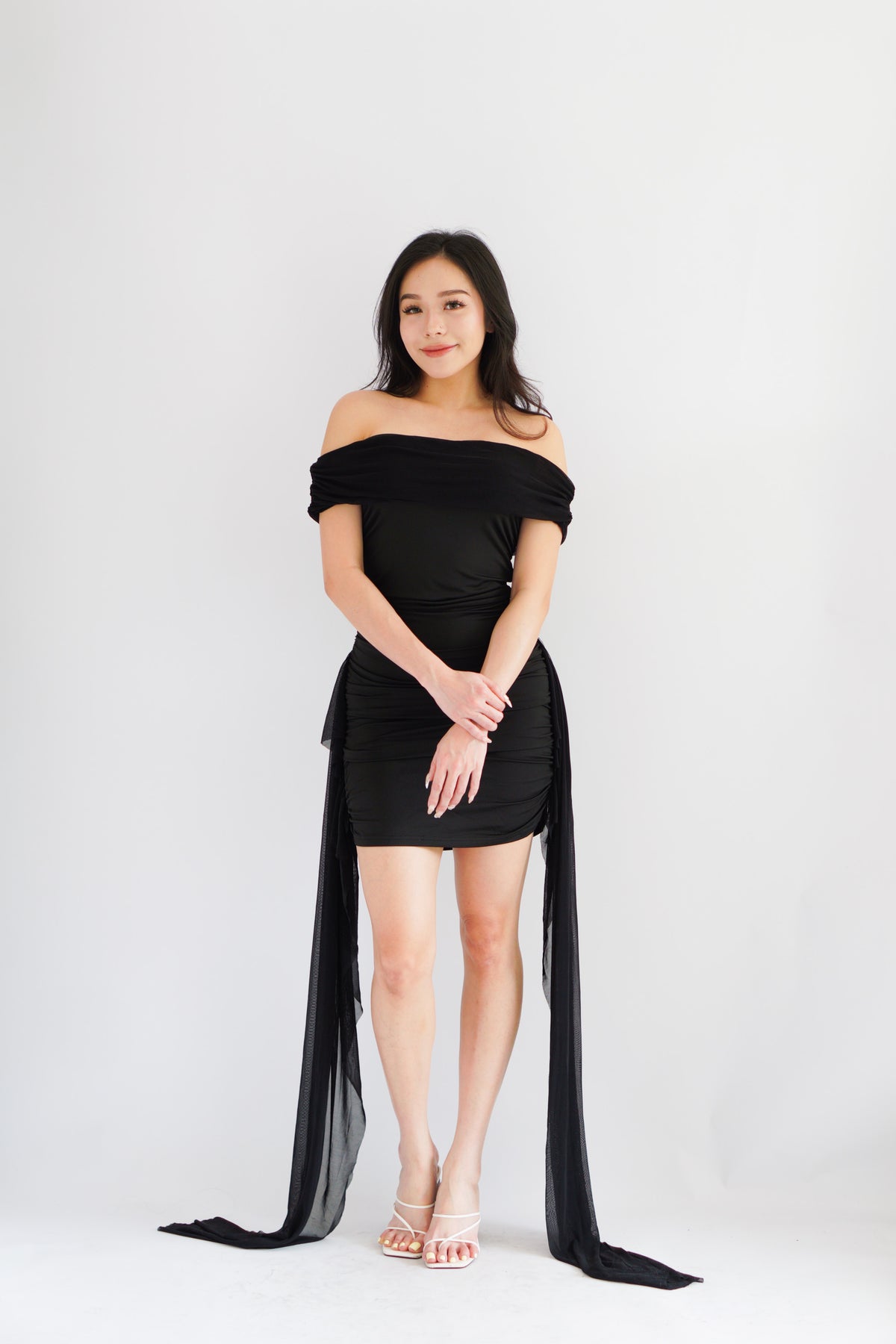 Izabel Off Shoulder Mini Bodycon Dress with Long Sash in Black