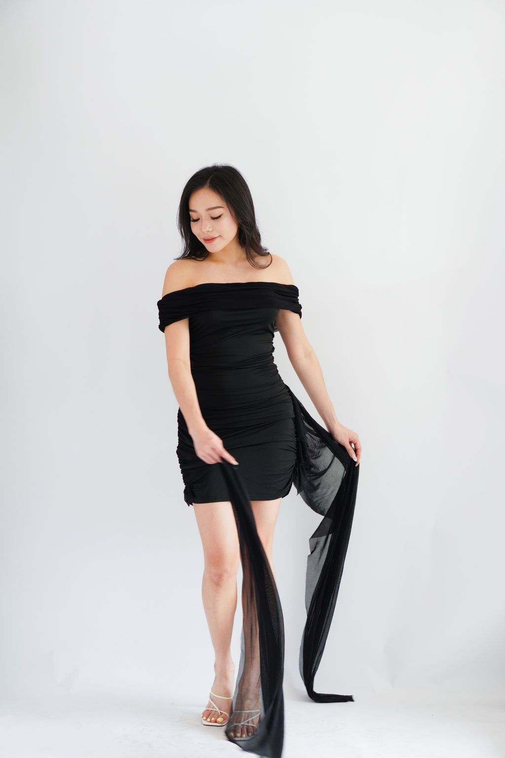 Izabel Off Shoulder Mini Bodycon Dress with Long Sash in Black