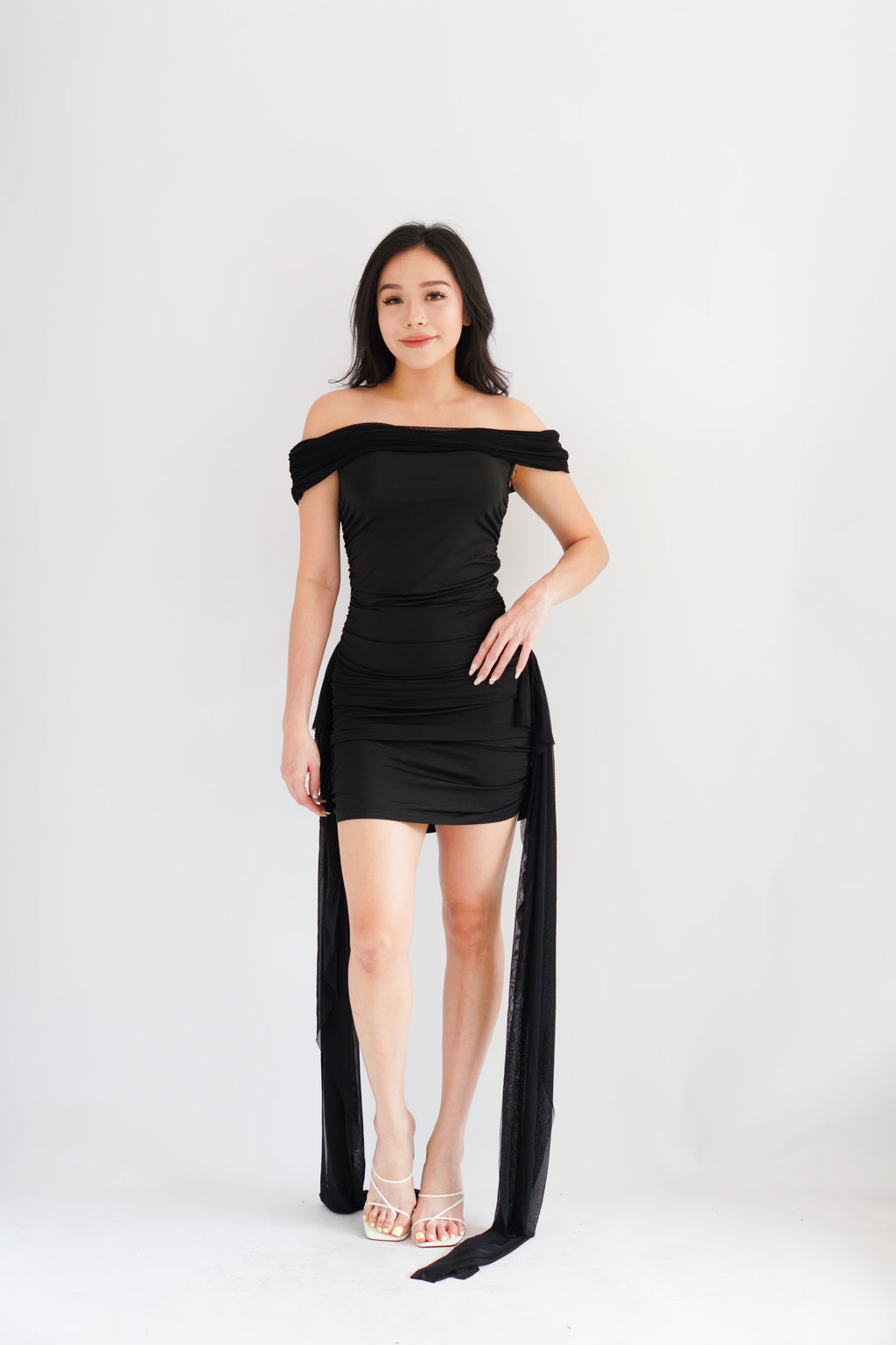 Izabel Off Shoulder Mini Bodycon Dress with Long Sash in Black