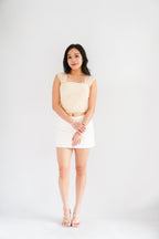 Velisse Mesh Ruched Crop Top in Beige Yellow