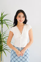Siekka V Neck Padded Lace Ribbon Short Sleeves Top in White