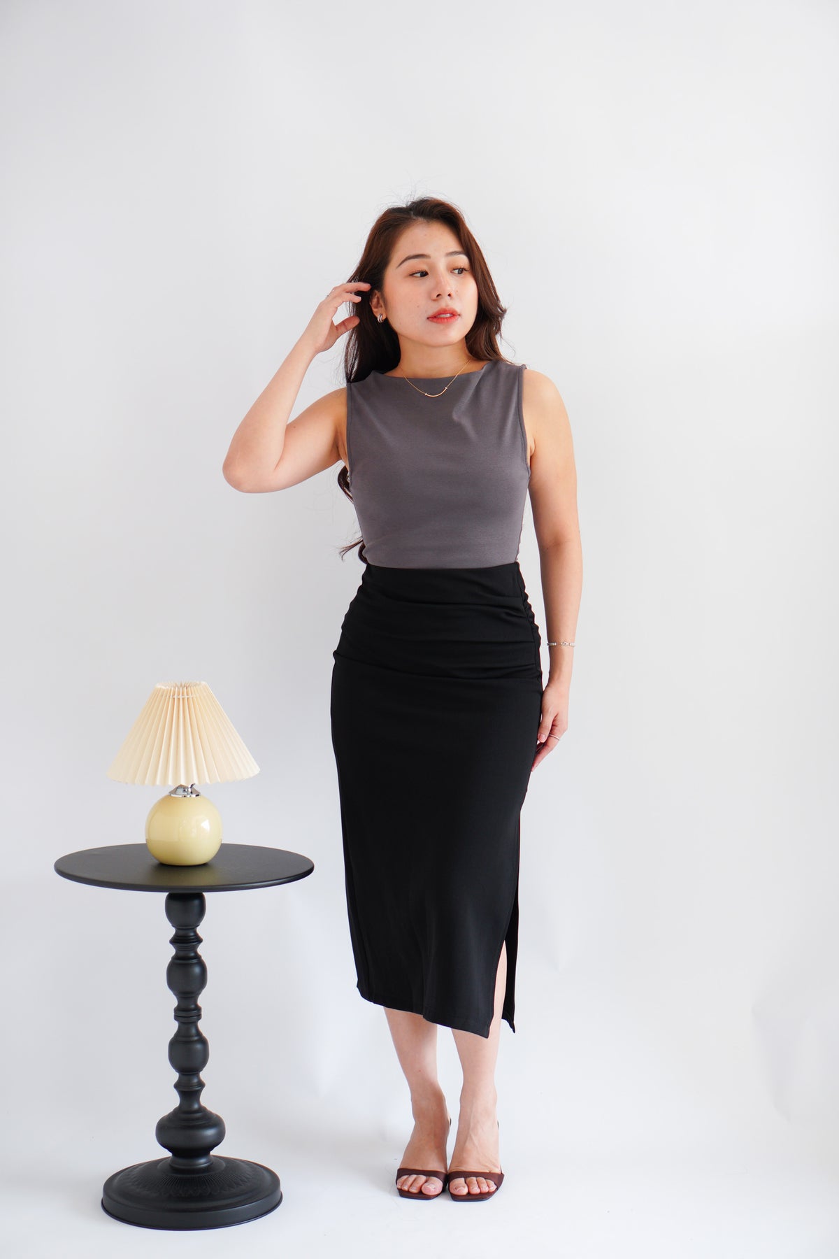 Kora Ruched Bodycon Midi Skirt in Black