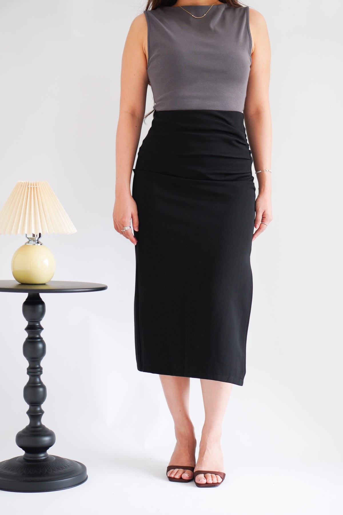 Kora Ruched Bodycon Midi Skirt in Black