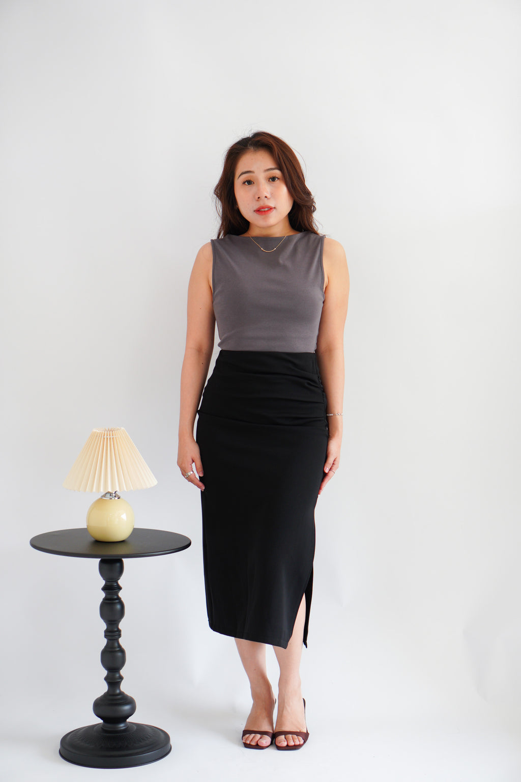 Kora Ruched Bodycon Midi Skirt in Black