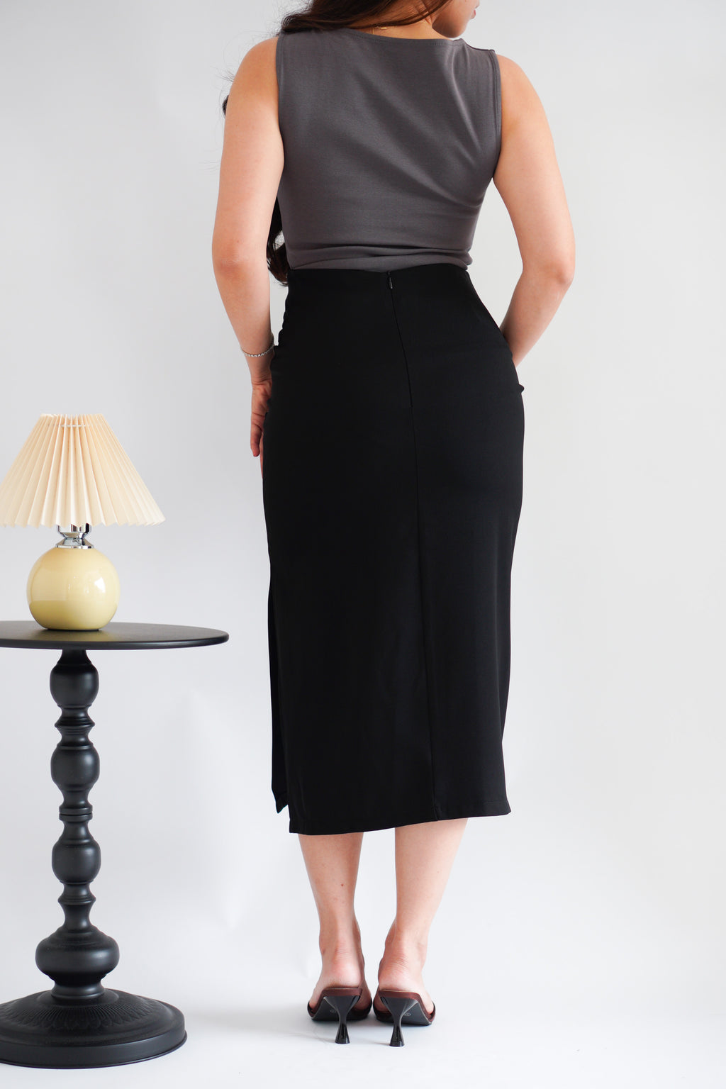 Kora Ruched Bodycon Midi Skirt in Black