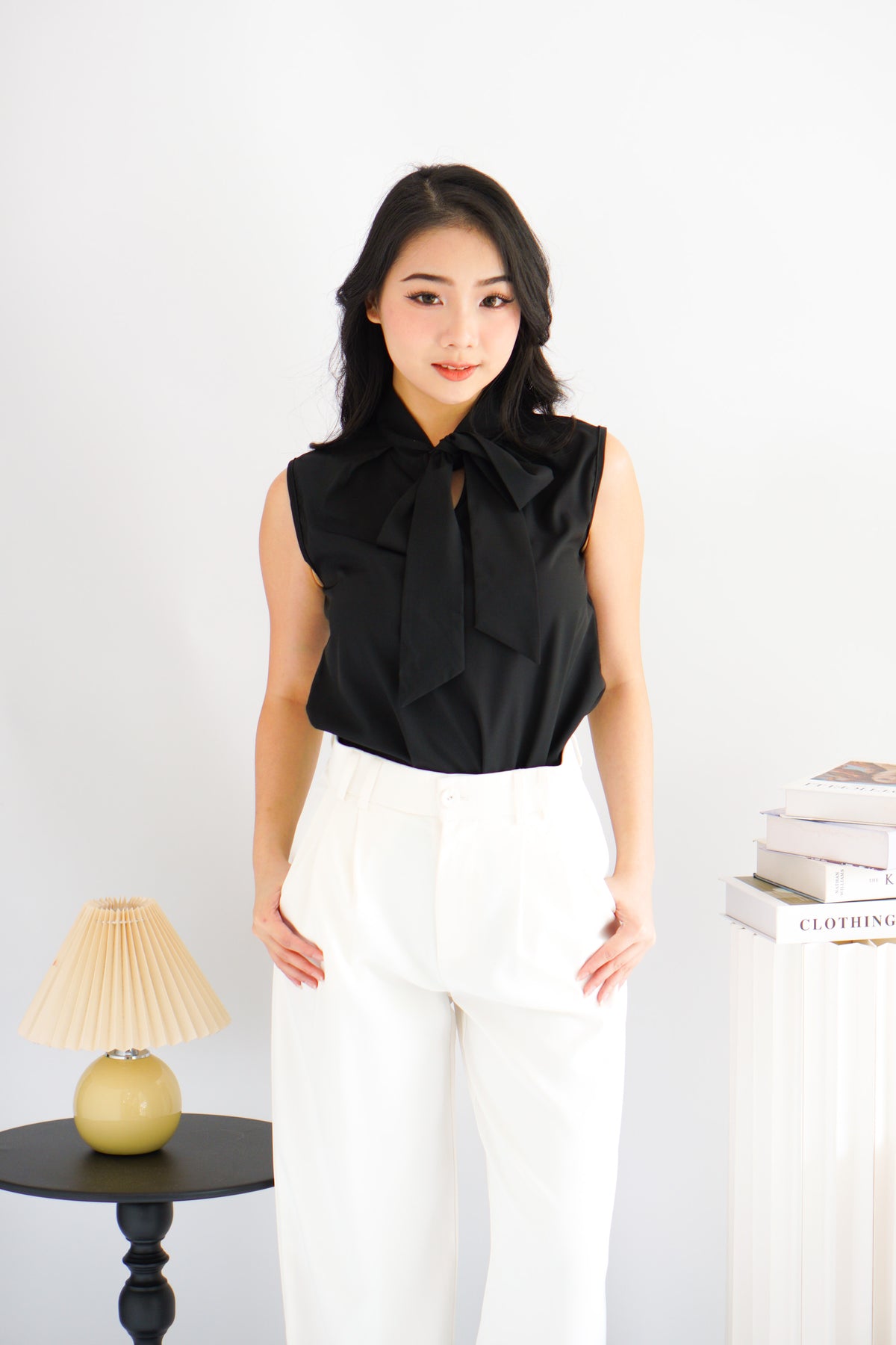 Rinda Sleeveless Bow Tie Top in Black