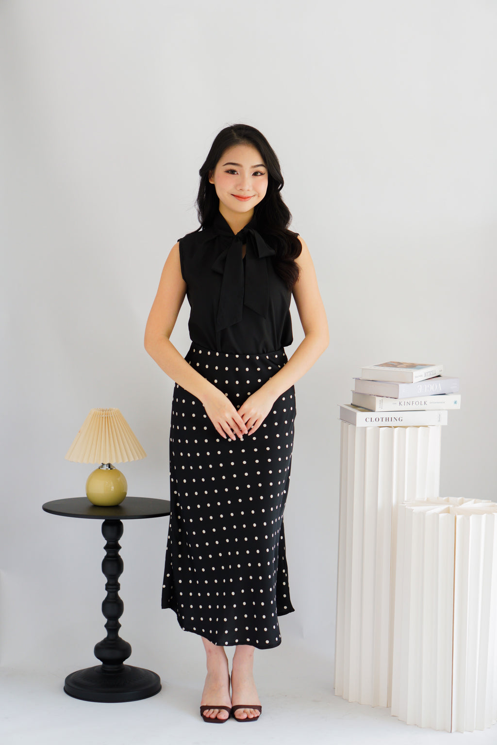 Rinda Sleeveless Bow Tie Top in Black