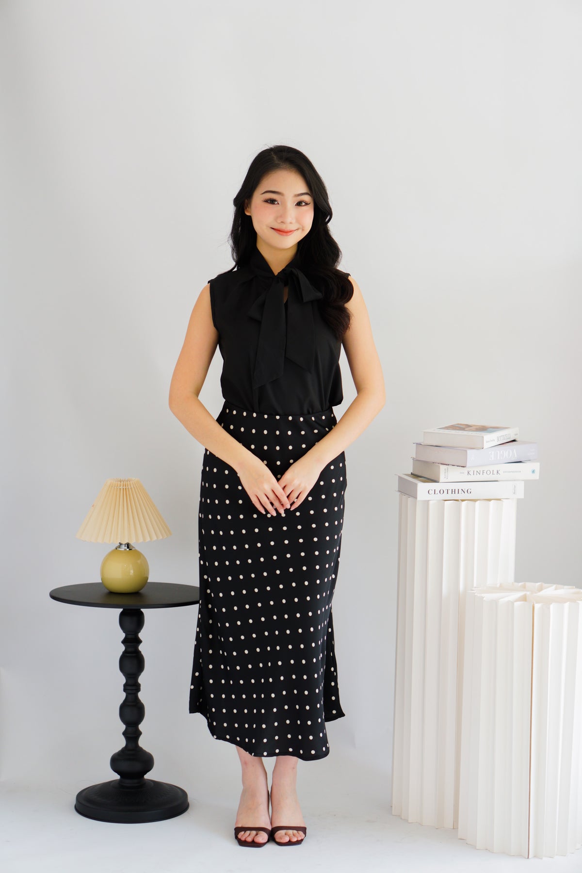 Rinda Sleeveless Bow Tie Top in Black