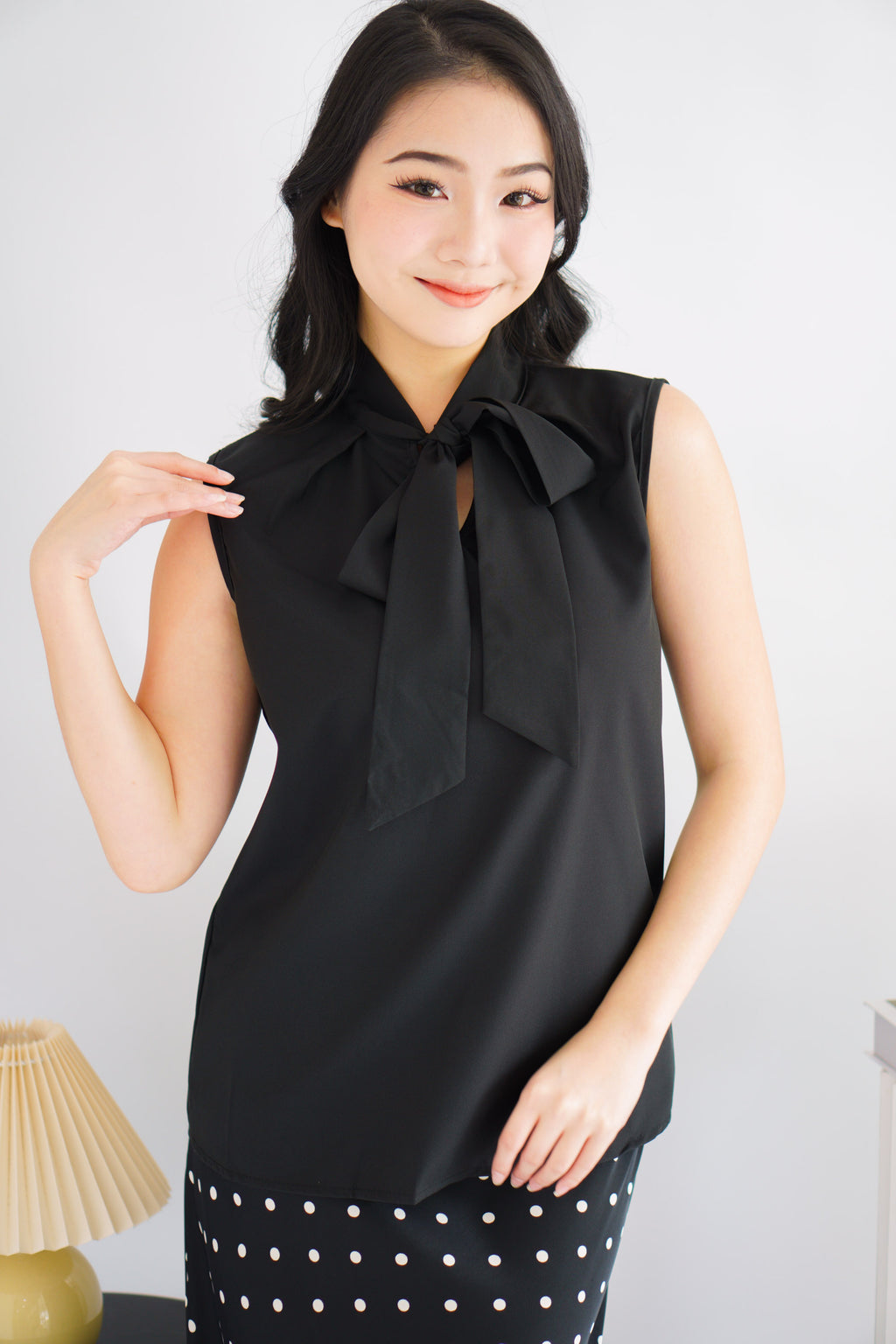 Rinda Sleeveless Bow Tie Top in Black