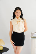 Rinda Sleeveless Bow Tie Top in Beige