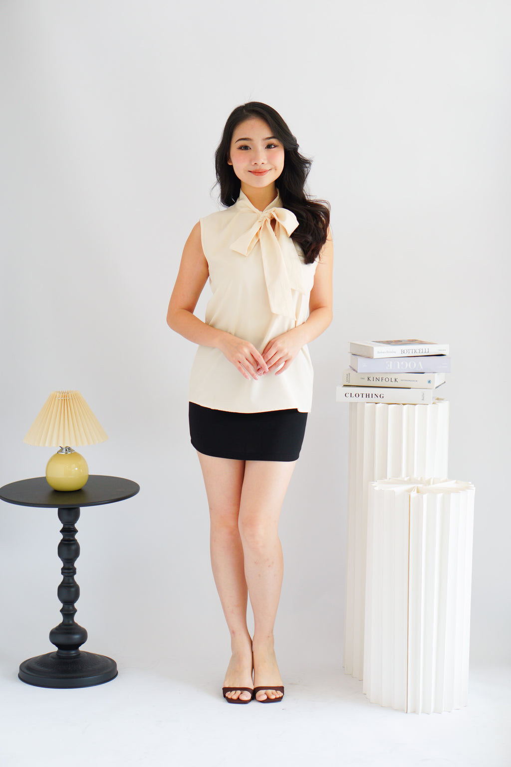 Rinda Sleeveless Bow Tie Top in Beige