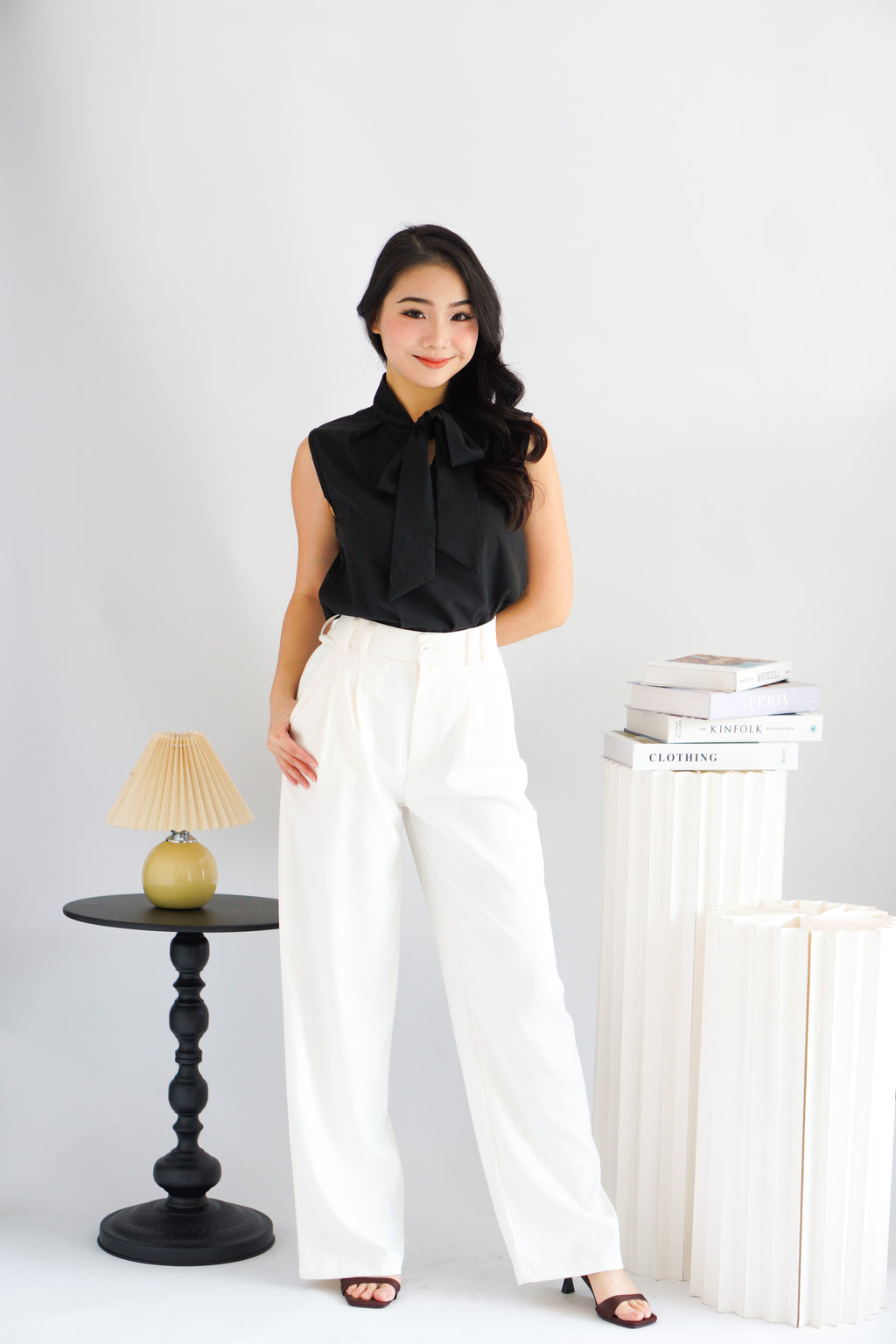 Rinda Sleeveless Bow Tie Top in Black