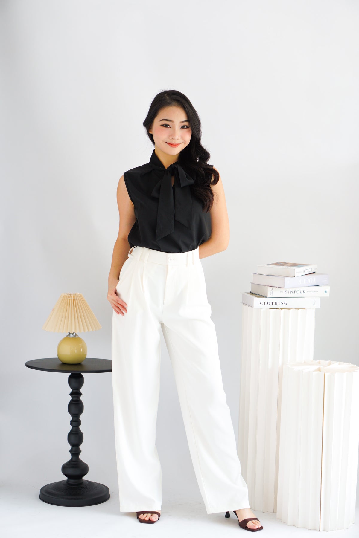 Rinda Sleeveless Bow Tie Top in Black