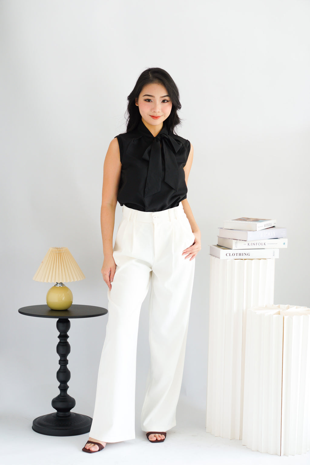 Rinda Sleeveless Bow Tie Top in Black