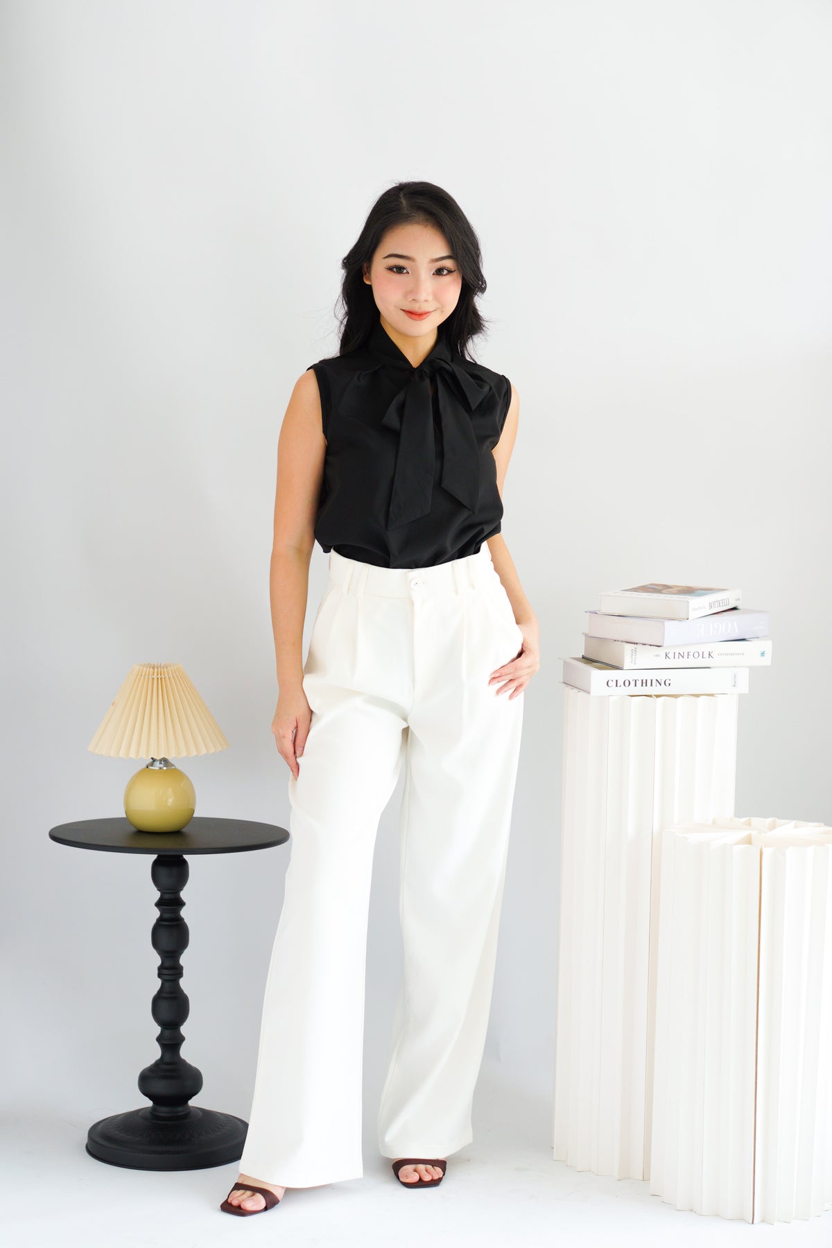 Rinda Sleeveless Bow Tie Top in Black