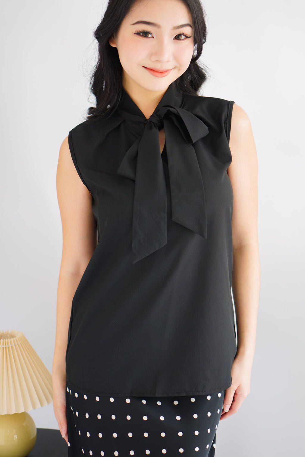 Rinda Sleeveless Bow Tie Top in Black