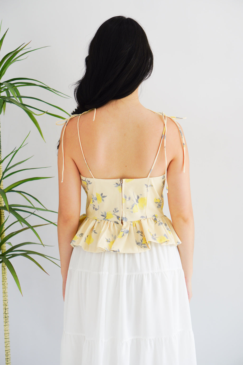 Cici Floral Bustier Peplum Top in Yellow