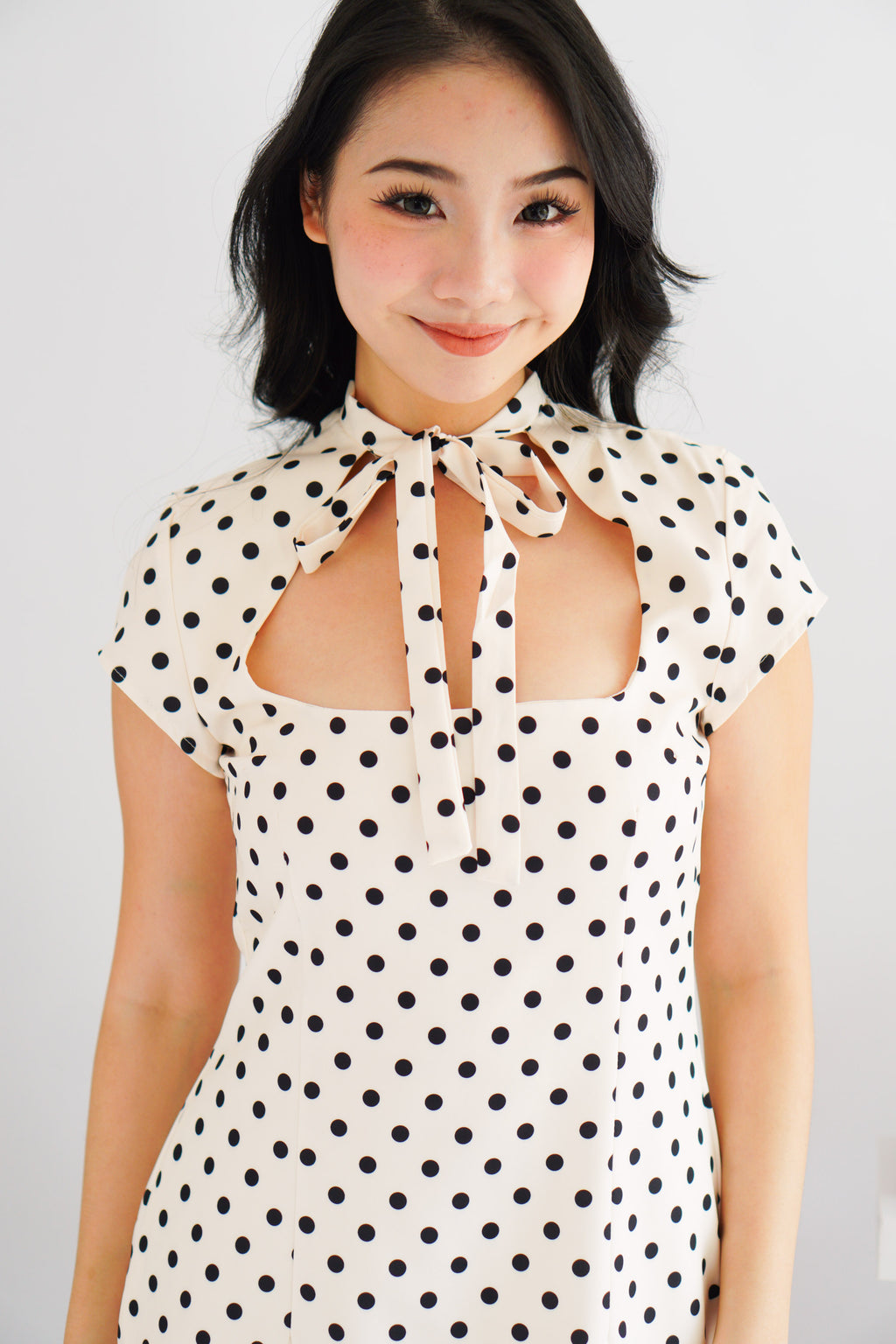 (BACKORDER) Dottini Self Tie High Neck Mini Polkadot Dress in Cream