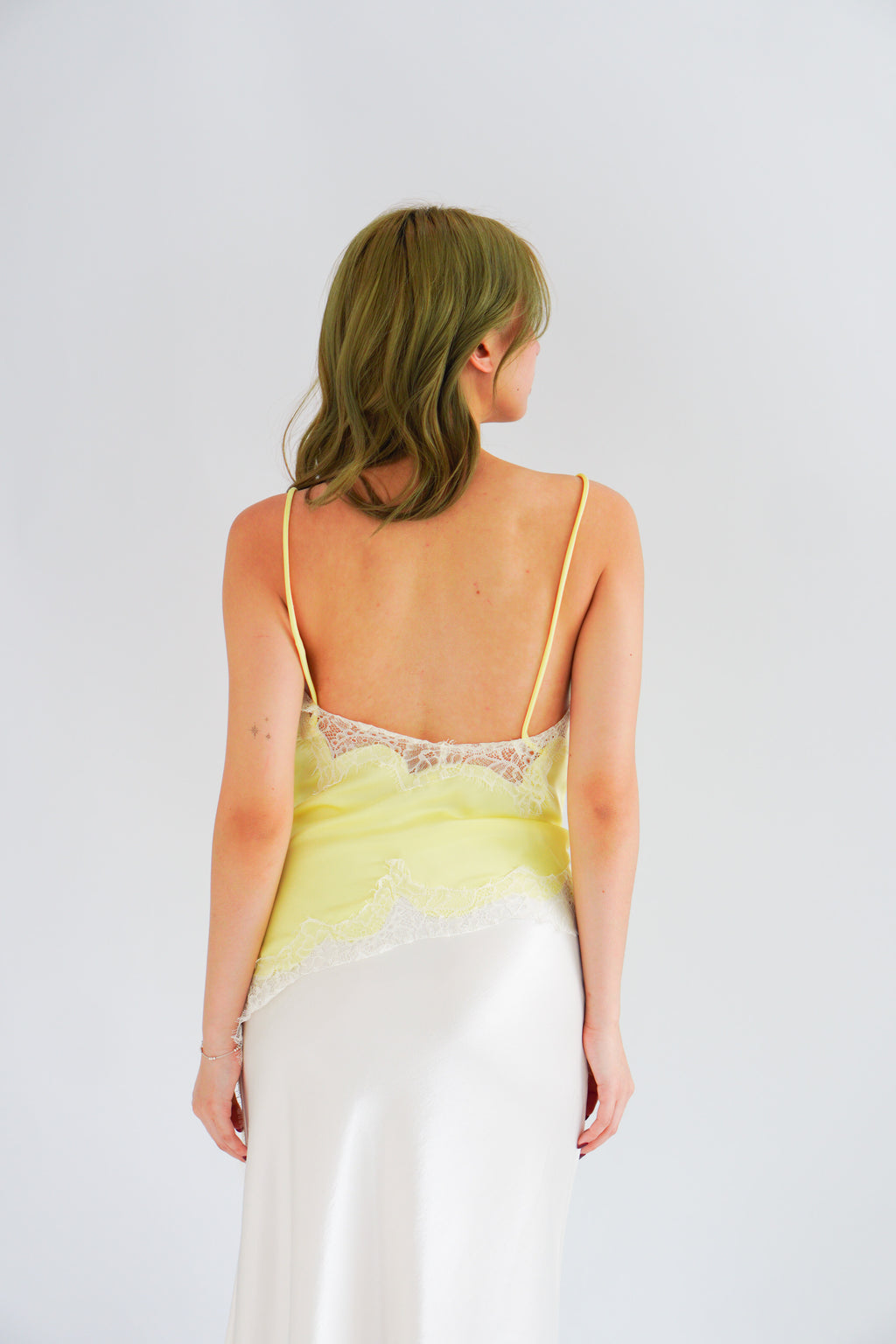 Zinira Asymmetrical Lace Camisole Top in Yellow