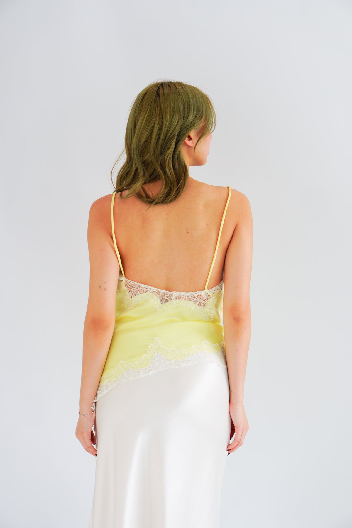 Zinira Asymmetrical Lace Camisole Top in Yellow