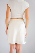 Kitri Mini Satin Skirt in Cream