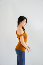 Myoka Ruched Toga Top in Mustard
