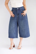 Greyson Wide Legged Cropped Denim Jeans in Dark Blue