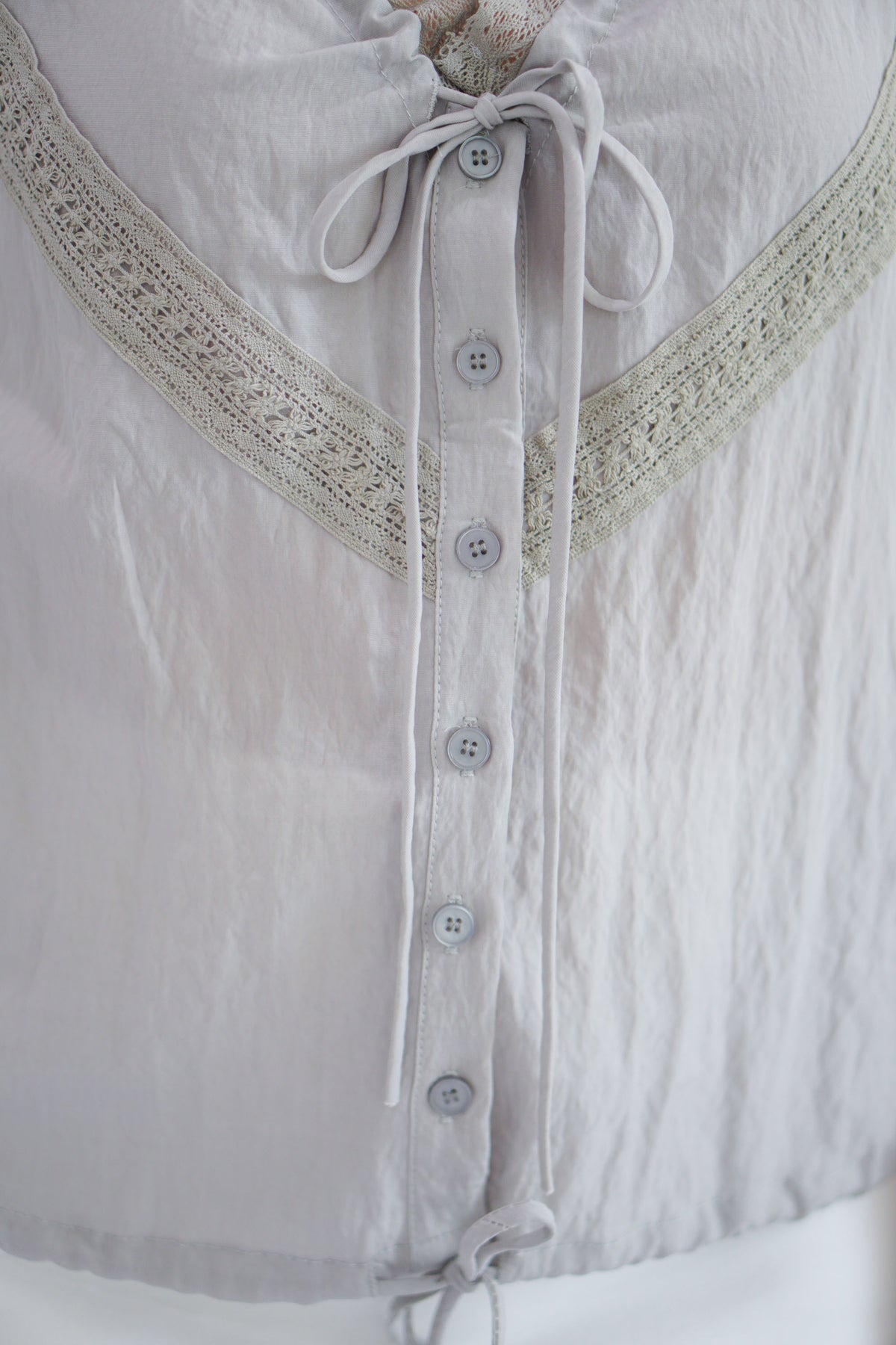 Selkie Lace Trim V Neck Button Front Drawstring Top in Grey