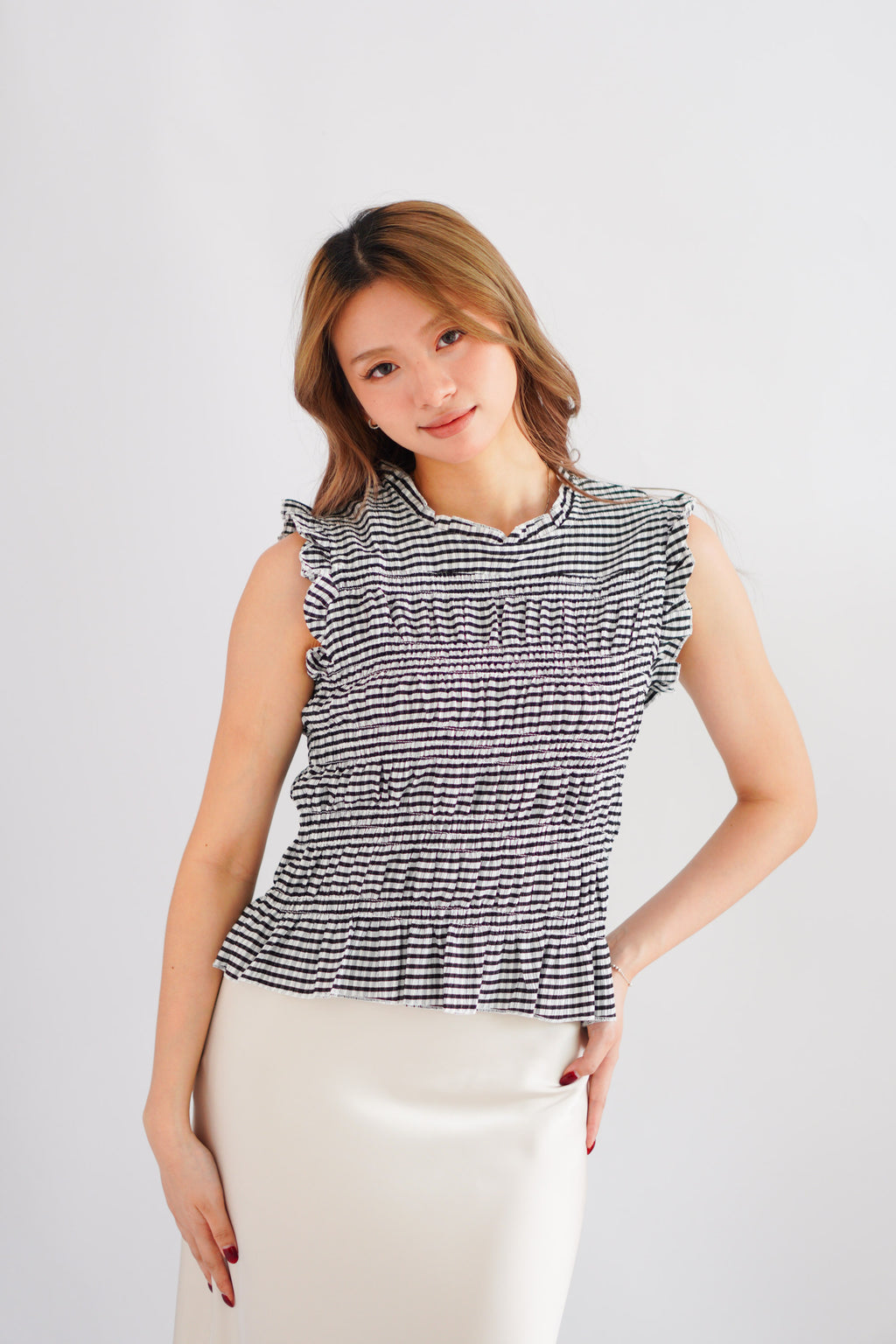 Carcy Gingham Smocked Top in Black